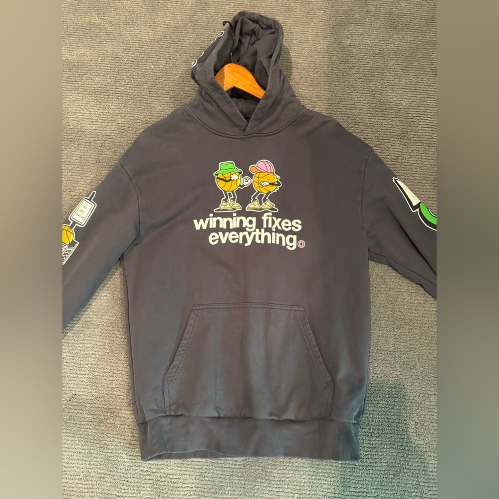 Overtime Graphic Sweatshirt “winning fixes everything”